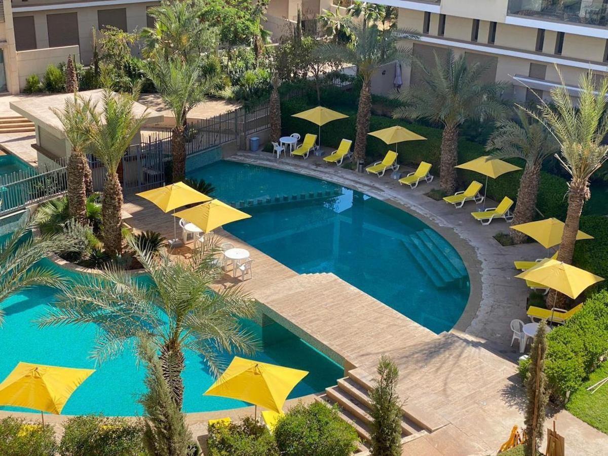 Appartement Bel A Marrakech Dans La Pearl Garden Avec Piscine Situee Sur La Route De Casablanca Sa Grande Terrasse A Splendide Vue Sur La Et Les Montagnes De L'atlas A Quelques Minutes Du Centre Et Du Grand Stade De Marrakec Marrakesh
